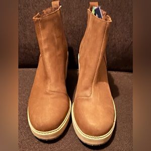 BRAND NEW WITH TAGS TOMS SUEDE BOOTIES WITH 3.5” wedge heel. Color cognac brown.